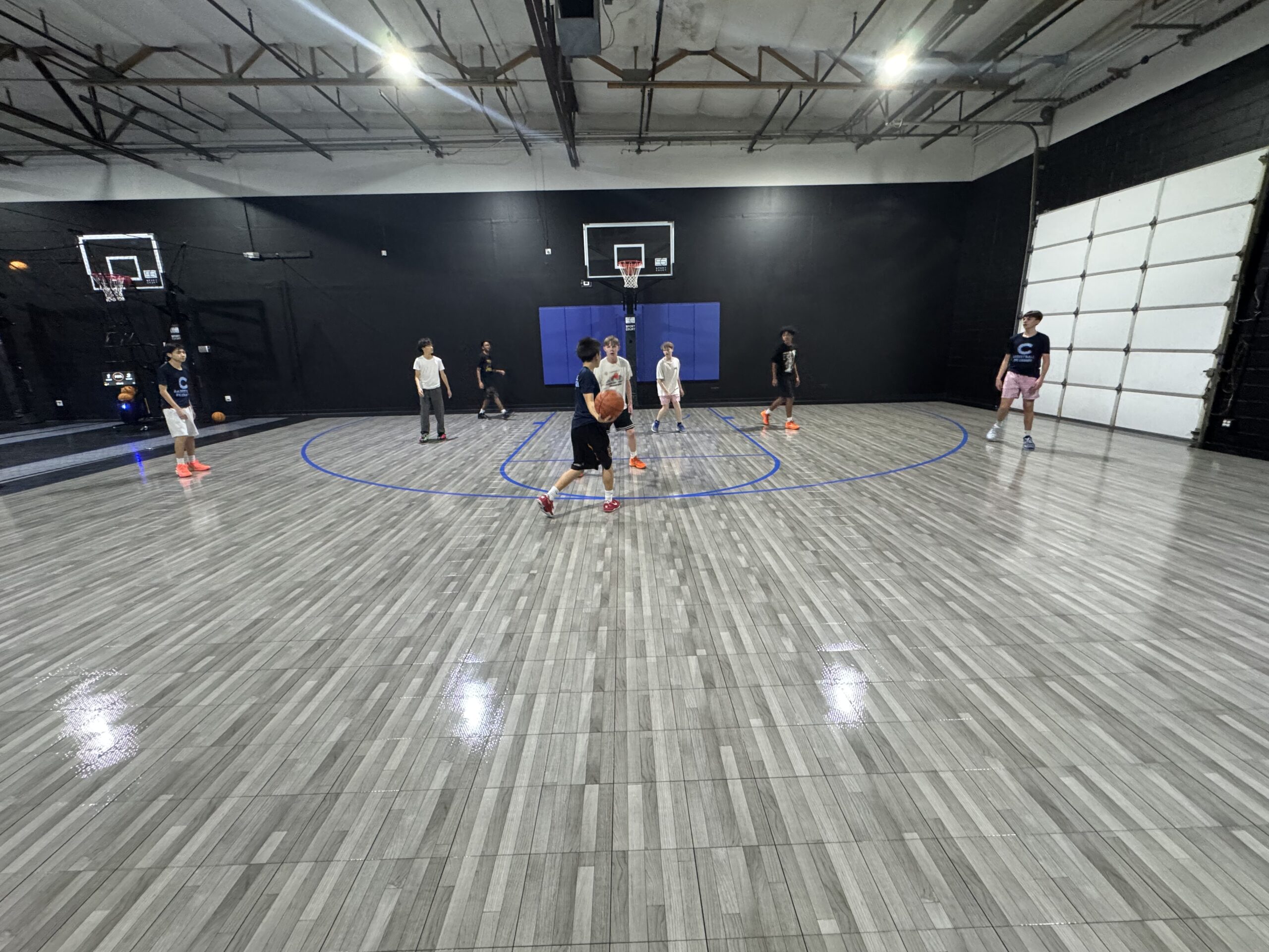 Players training on the Ballin Elite half court
